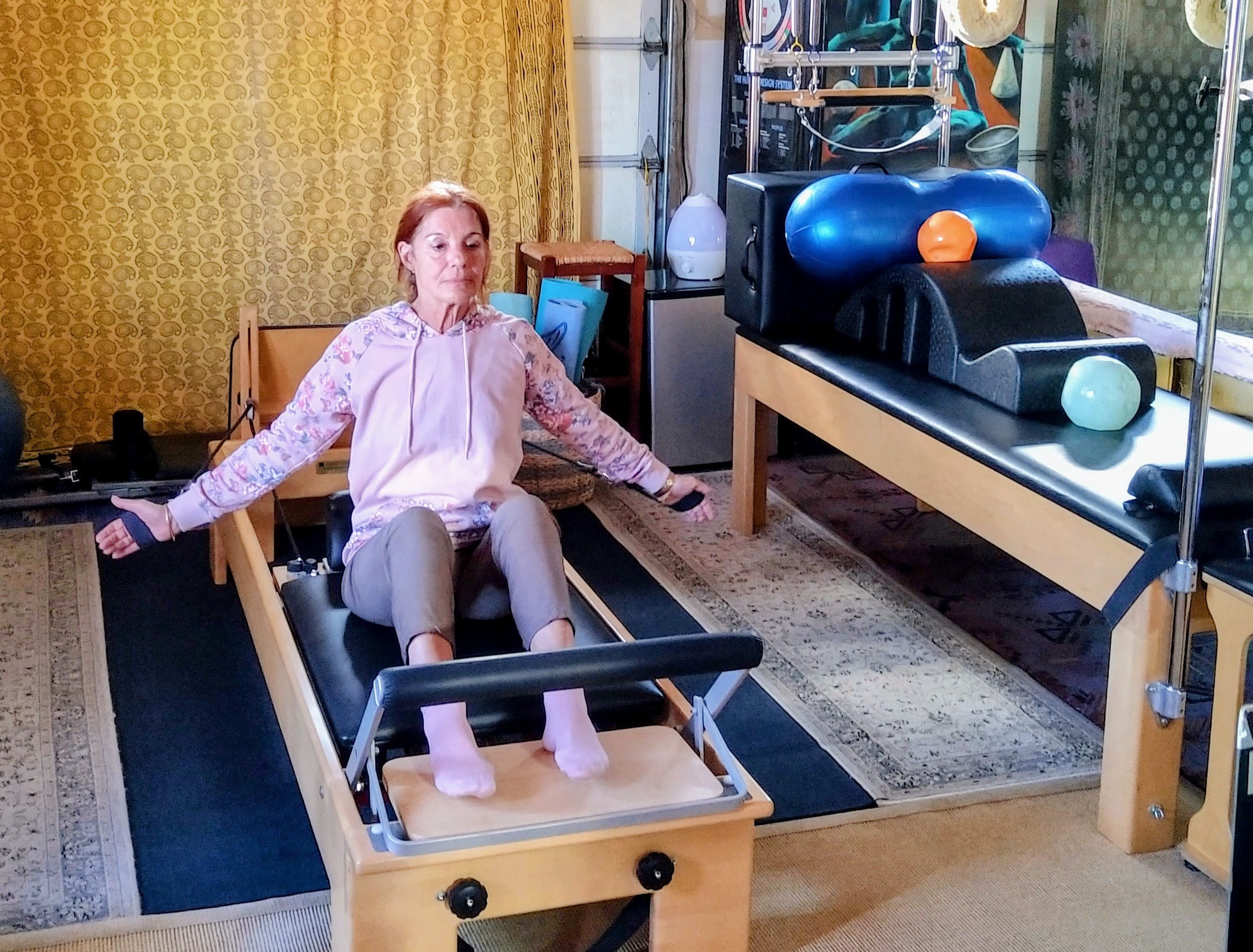 Private Pilates practice on a Reformer